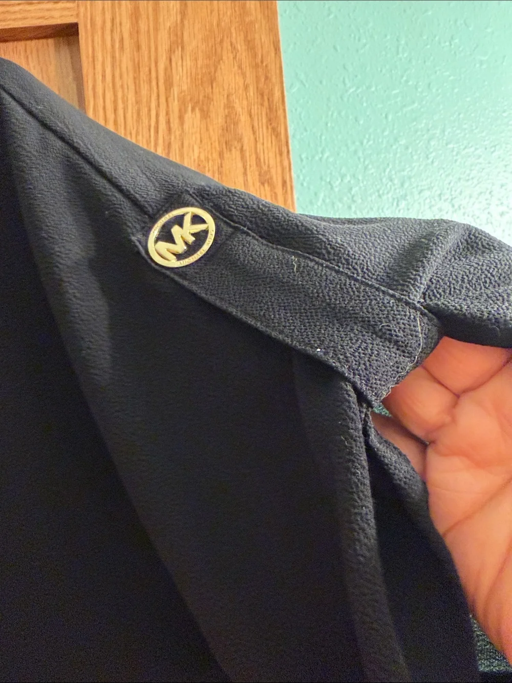 Michael Kors Black Blouse with Smocked Hem and MK Accent Buttons